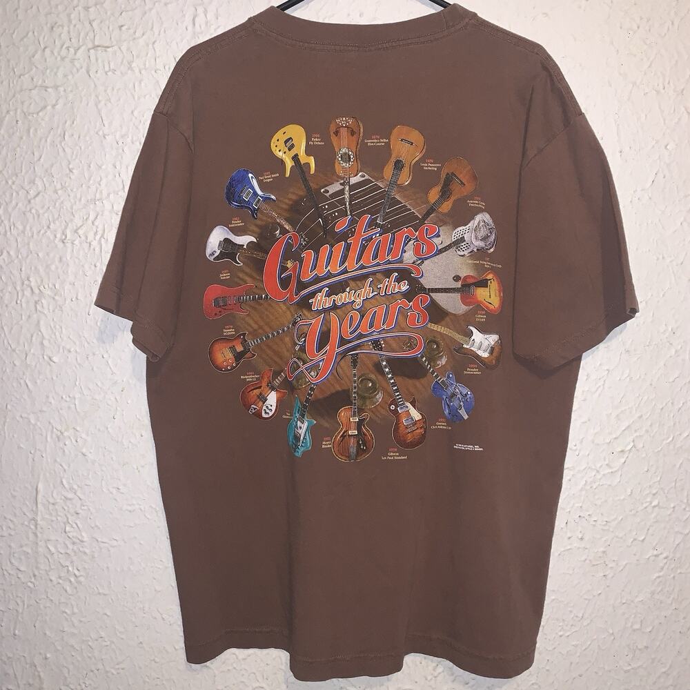 Vintage 90s Guitars Through The Years Shirt Brown Gi Apparel Shirt XL